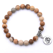 Laden Sie das Bild in den Galerie-Viewer, yoga chakra bracelet with om symbol